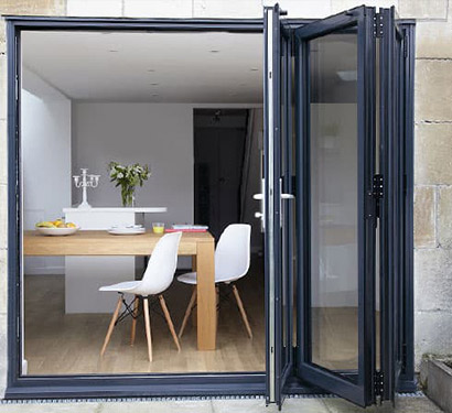 Three-Panels-Matt-Black-Aluminium-Folding-Door-In-Dining-Room