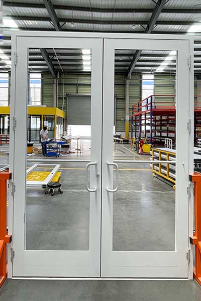 white-aluminium-ADA-doors